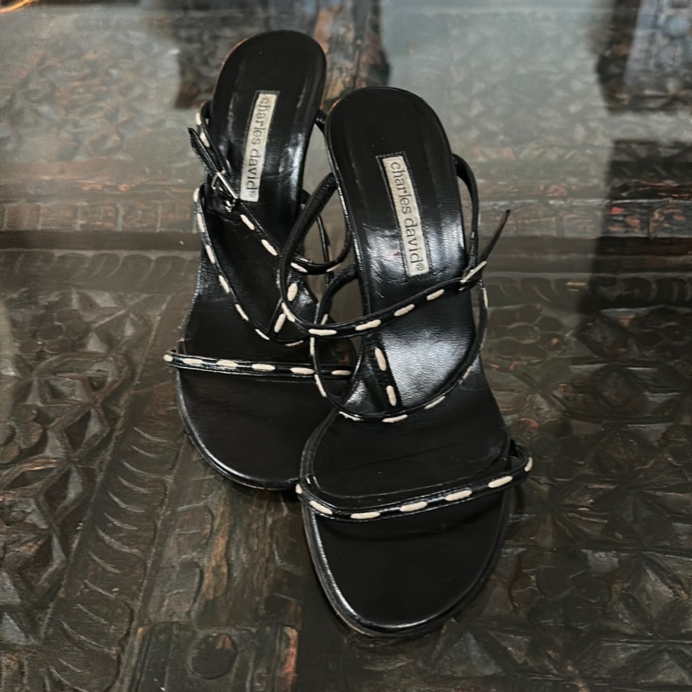 Black leather with White stitch heels.